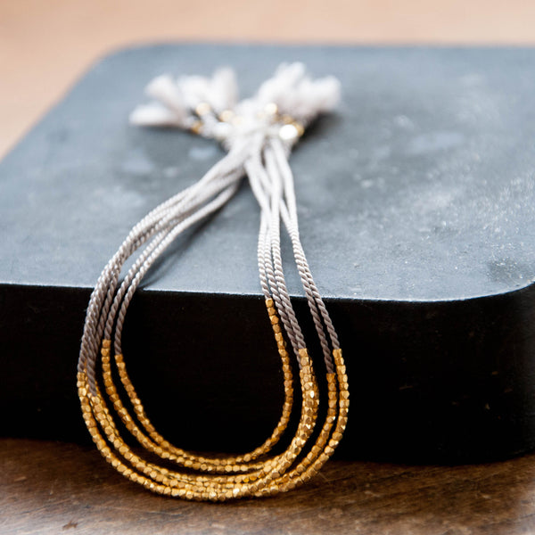 Delicate Gold on Gray Silk Friendship bracelets by Vivien Frank Designs