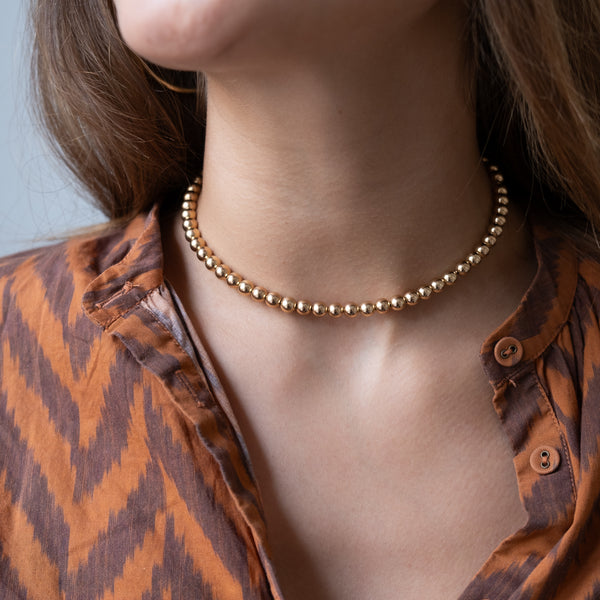 Gold Bead Necklace by Vivien Frank Jewlery beaded gold necklace choker necklace