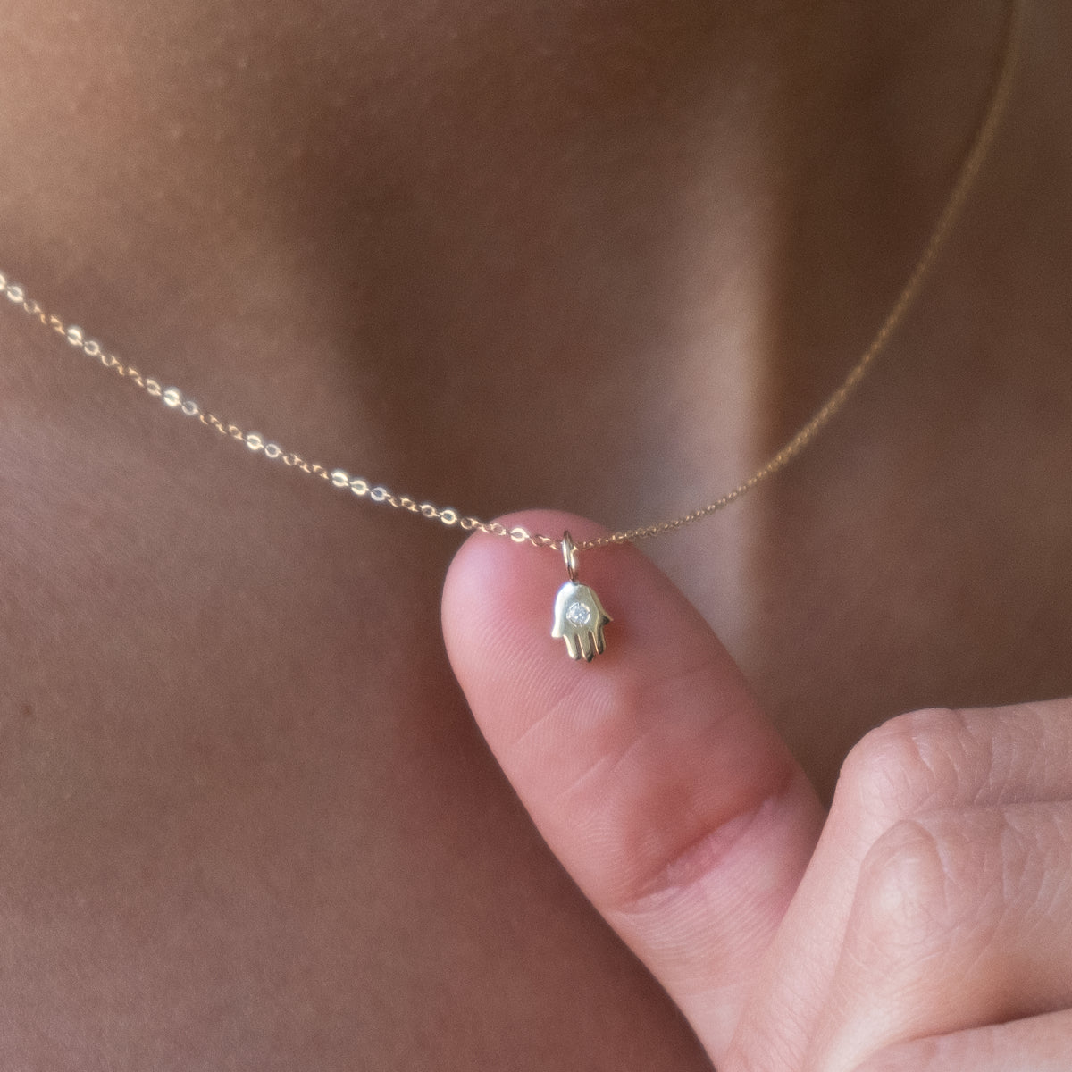 14k Gold Tiny Hamsa necklace