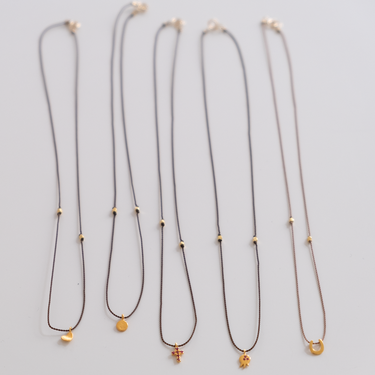 14k gold Heart with diamond Charm necklace on silk
