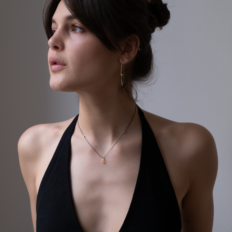 14k gold Wishbone Charm necklace on silk