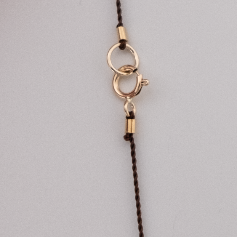 14k gold Wishbone Charm necklace on silk