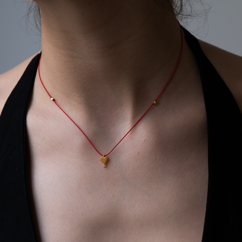 14k gold Heart with diamond Charm necklace on silk