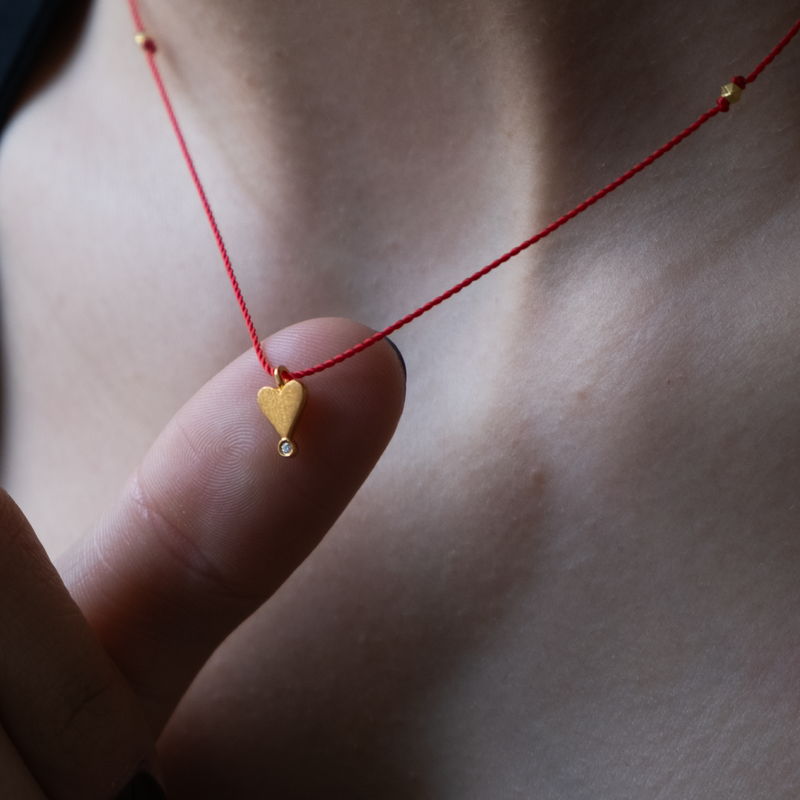 14k gold Heart with diamond Charm necklace on silk