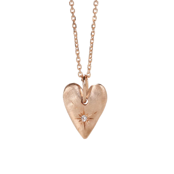 Heart pendant 14k gold with star set diamond
