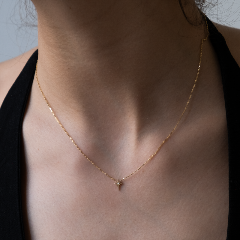 Nordic star pendant 14k gold with single white diamond