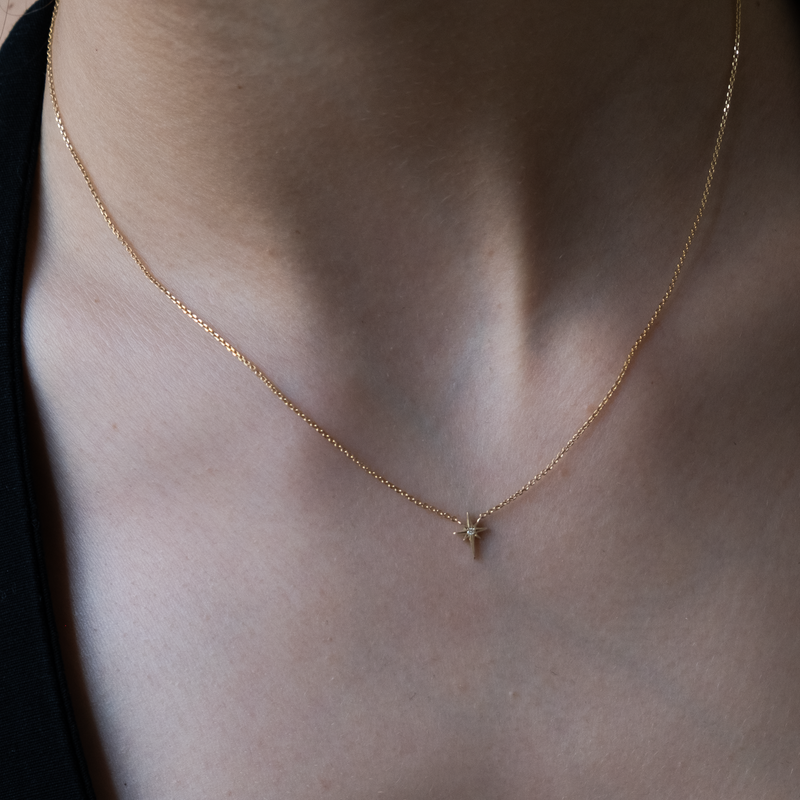 Nordic star pendant 14k gold with single white diamond