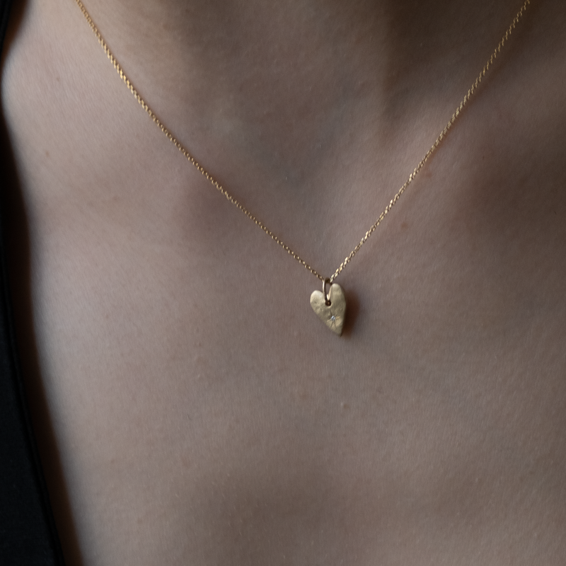 Heart pendant 14k gold with star set diamond
