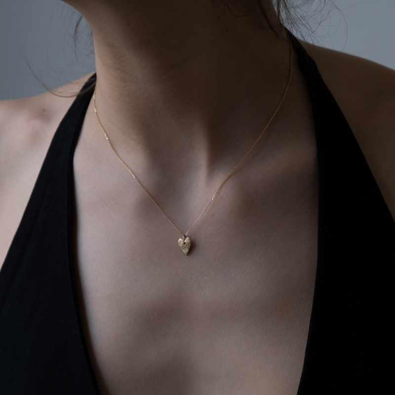Heart pendant 14k gold with star set diamond