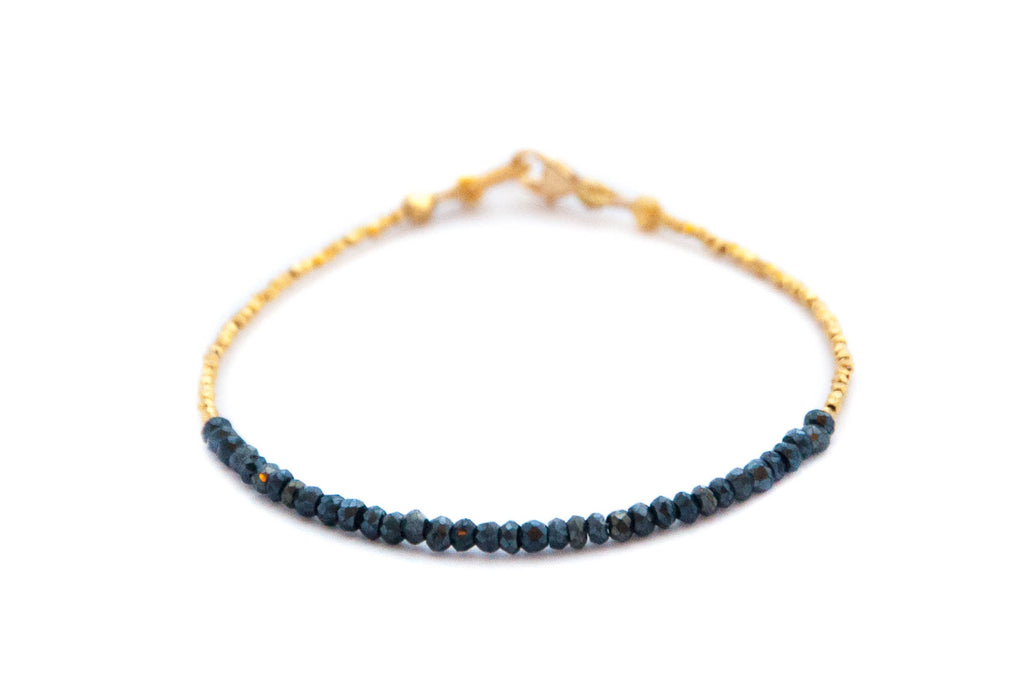 Black spinel Tennis bracelet with gold by Vivien Frank – Vivien
