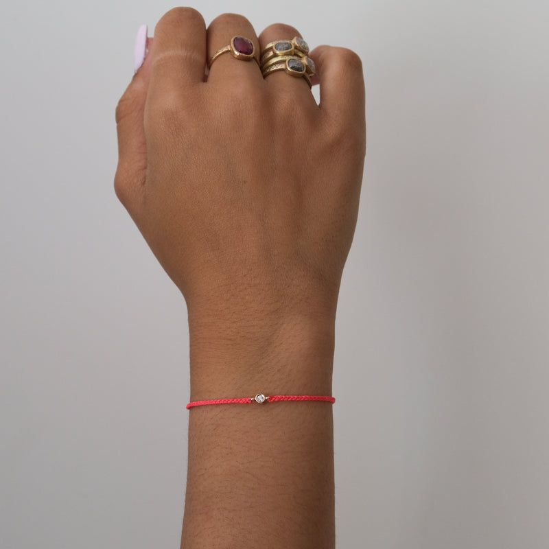Diamond solitaire cord bracelet