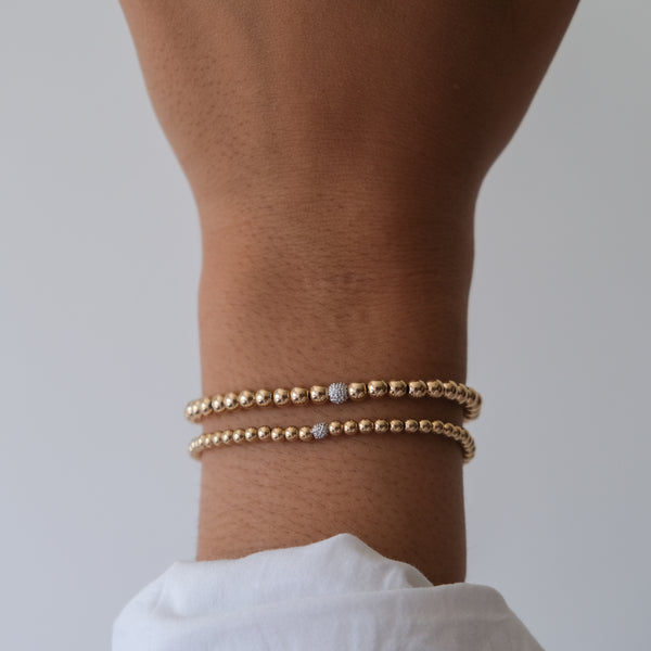 14k Yellow Gold beaded Bracelet with diamond accent